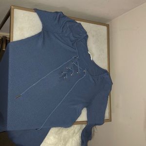 Long blue dress, cross neck